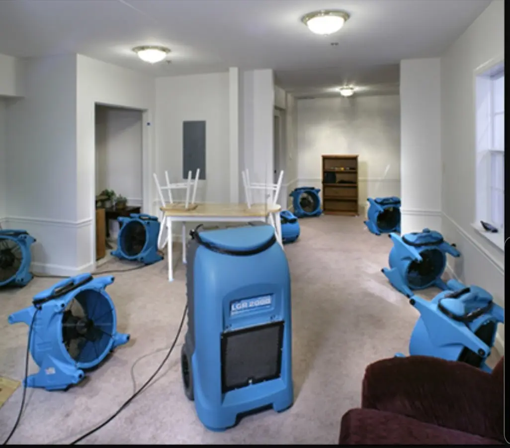 Air movers and dehumidifier setup for Water Damage Restoration in East Grand Forks